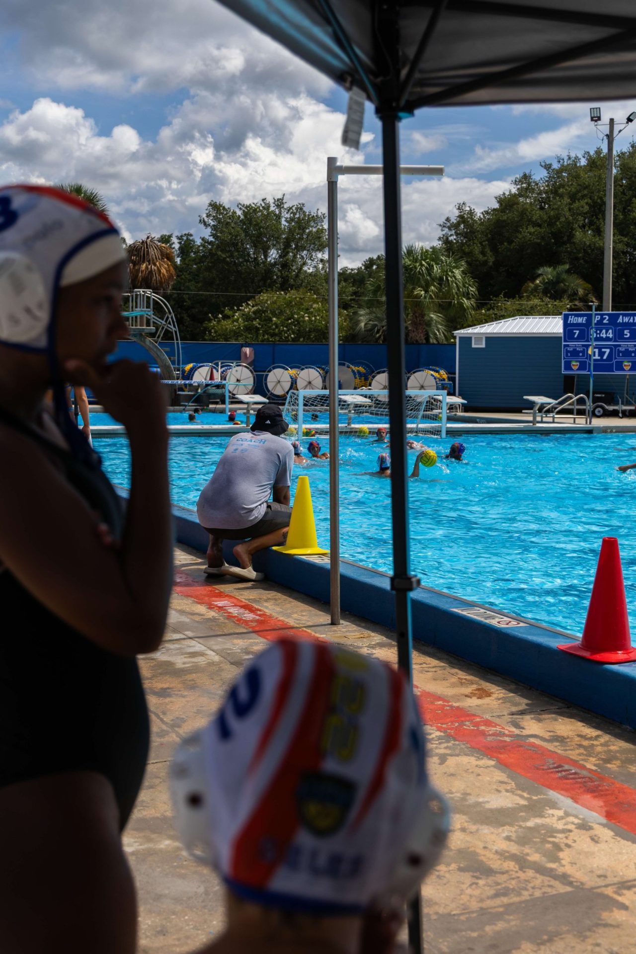 A girl on looks the scrimmage at the Florida Water Polo Event 2026