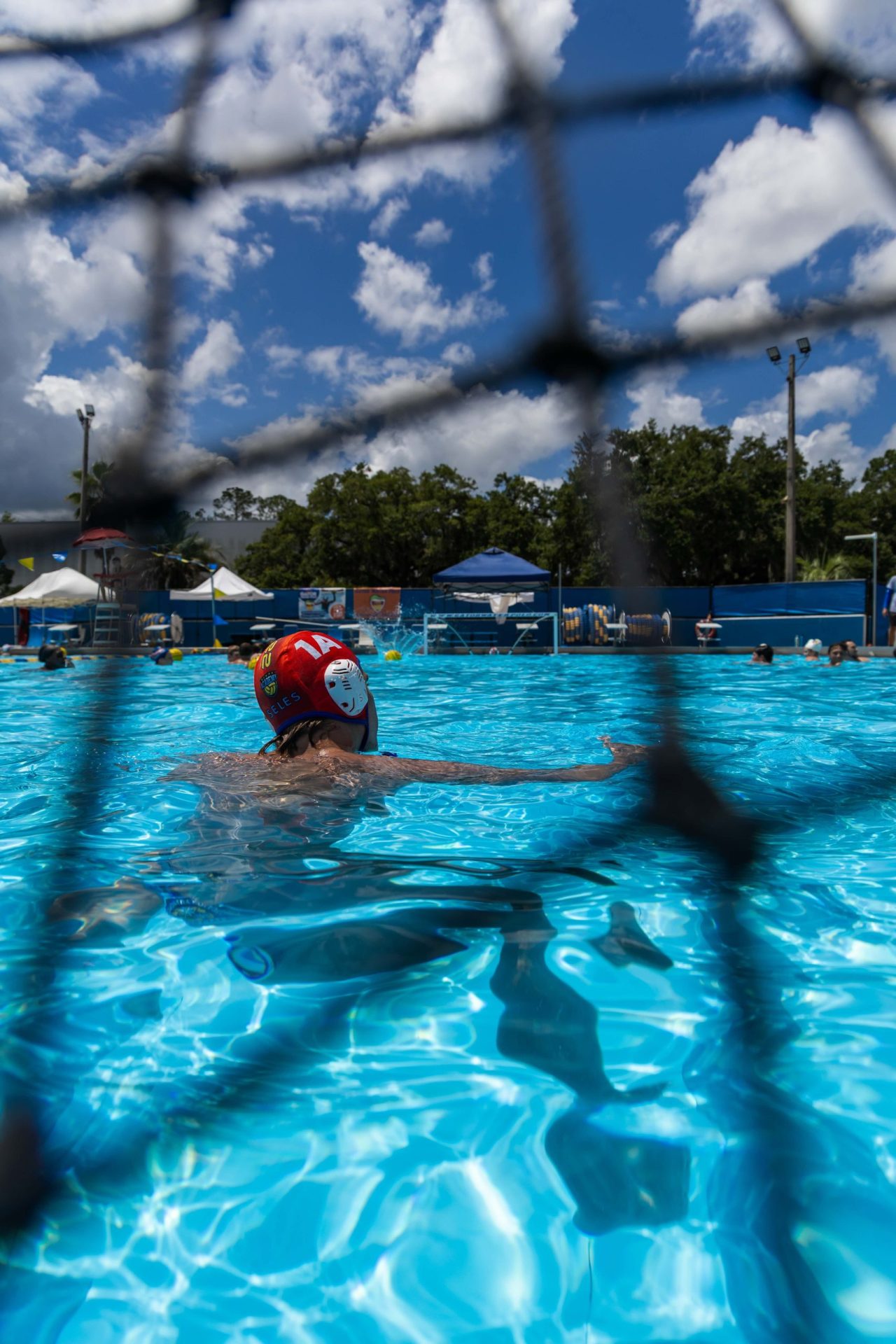 Youth Goalie Blocks a ball during the Summer 2026 Florida Water Polo
